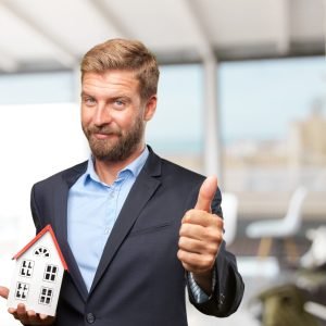 blond businessman happy expression